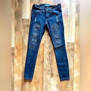 Black Skinny Jeans with Distressing and Tapered Fit